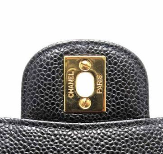 Close-up used to assess Chanel hardware, screws and engravings