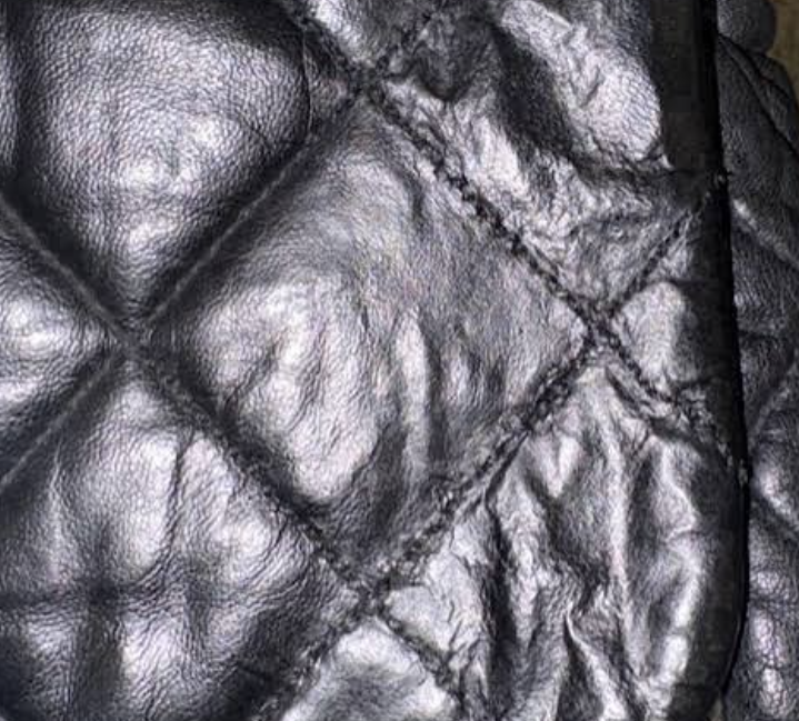 Close-up used to assess Chanel stitching, quilting and material finish